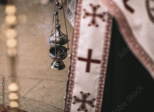 religious detail from orthodox church. Kandilo or cresset during liturgy