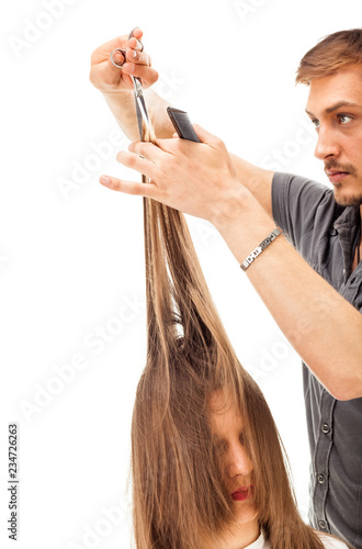 Professional hairdresser with long hair model, isolated on white