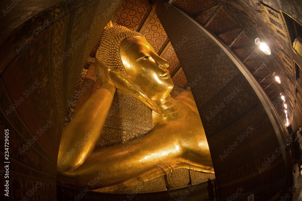 The largest golden  Reclinging Buddha in Wat Pho , Bangkok, Thailand.