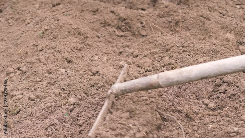 to work the earth with a rake to work the earth with a rake