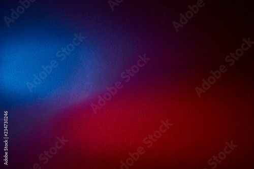 Textural background with a uniform distribution of red and blue