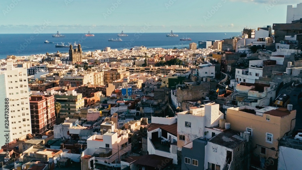 Fototapeta premium aerial drone footage of the city with beautiful seascape the old town at sunset