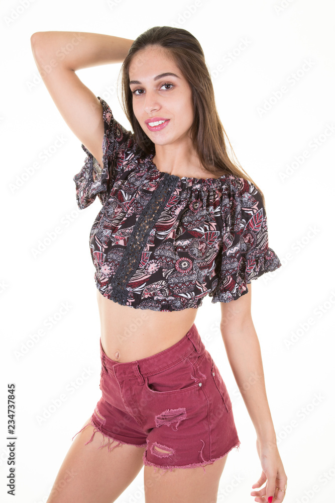 Studio shot of good-looking beautiful young woman isolated against blank studio wall white background Studio shot of good-looking beautiful young woman isolated against blank studio wall white background