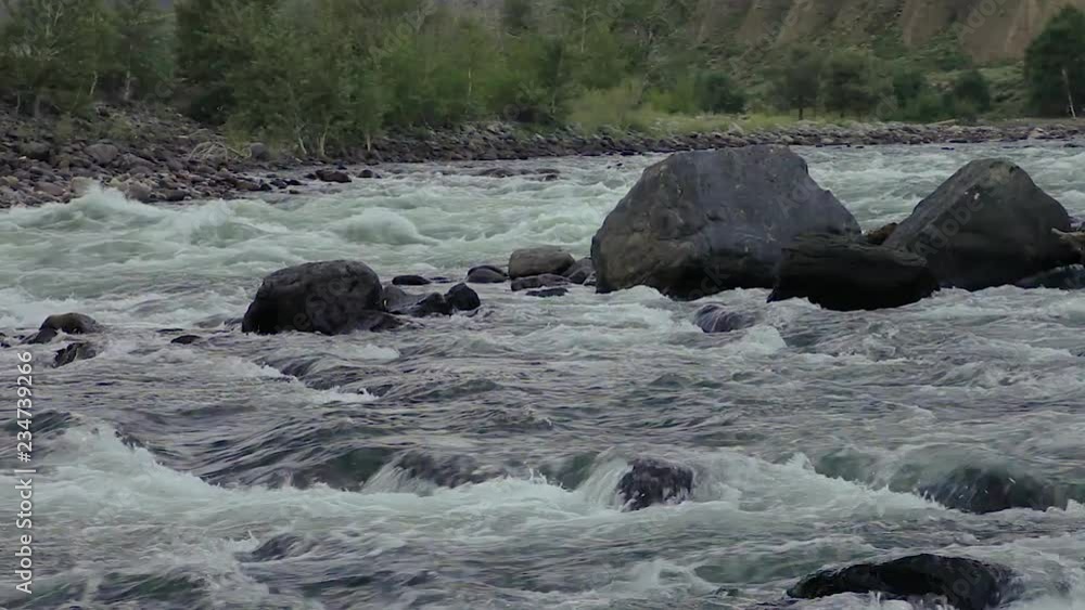 summer landscape mountain river Bank in the early morning in the fog. the rain clouds in the sky are moving fast . cloudy day, river Chulyshman, Gorny Altai summer landscape mountain river Bank in the early morning in the fog. the rain clouds in the sky are moving fast . cloudy day, river Chulyshman, Gorny Altai