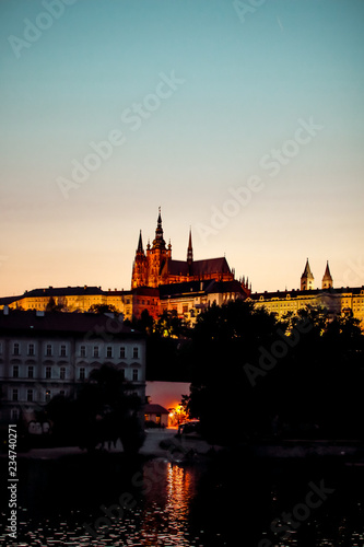 Prague, Bohemia, Czech Republic. Historic center included in the UNESCO World Heritage. The Metropolitan Cathedral of Saints Vitus in to the largest ancient castle. Evening. © plusminus20
