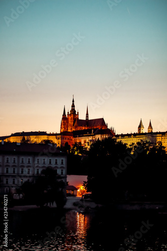 Prague, Bohemia, Czech Republic. Historic center included in the UNESCO World Heritage. The Metropolitan Cathedral of Saints Vitus in to the largest ancient castle. Evening.