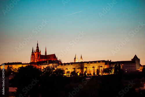Prague, Bohemia, Czech Republic. Historic center included in the UNESCO World Heritage. The Metropolitan Cathedral of Saints Vitus in to the largest ancient castle. Evening.