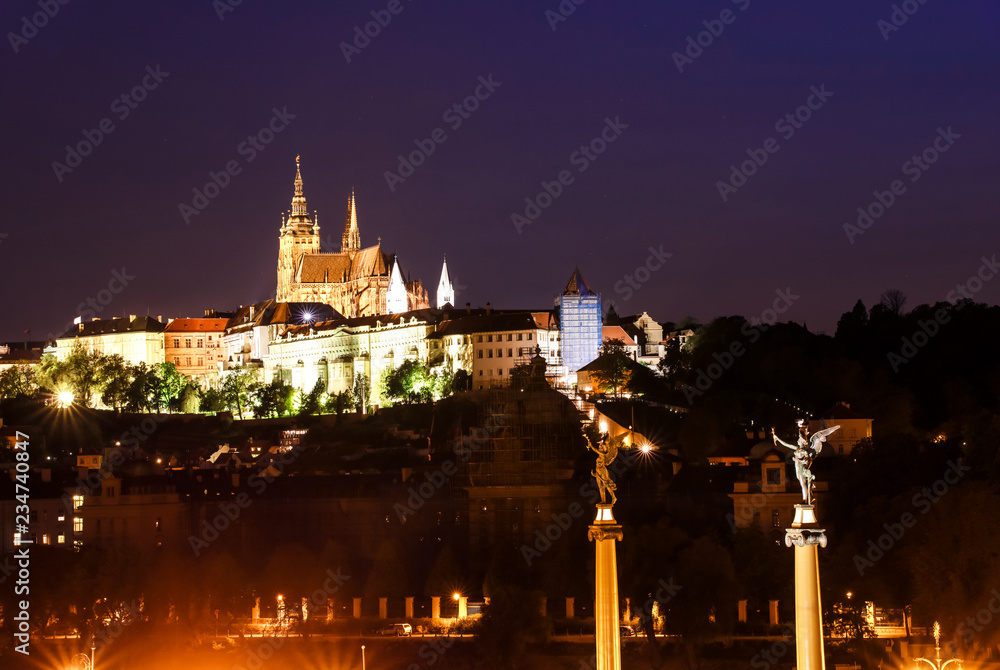Prague, Bohemia, Czech Republic. Historic center included in the UNESCO World Heritage. The Metropolitan Cathedral of Saints Vitus in to the largest ancient castle. Night scene.
