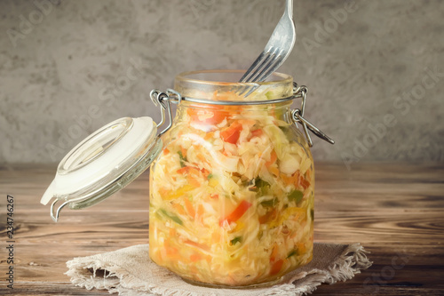Salad appetizer of fermented vegetables sauerkraut carrots and peppers