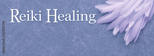 Angelic Reiki Healing Banner Head - a neat pile of long thin white feather in the right corner beside the words REIKI HEALING on a fibrous blue handmade  paper background with copy space
 photo