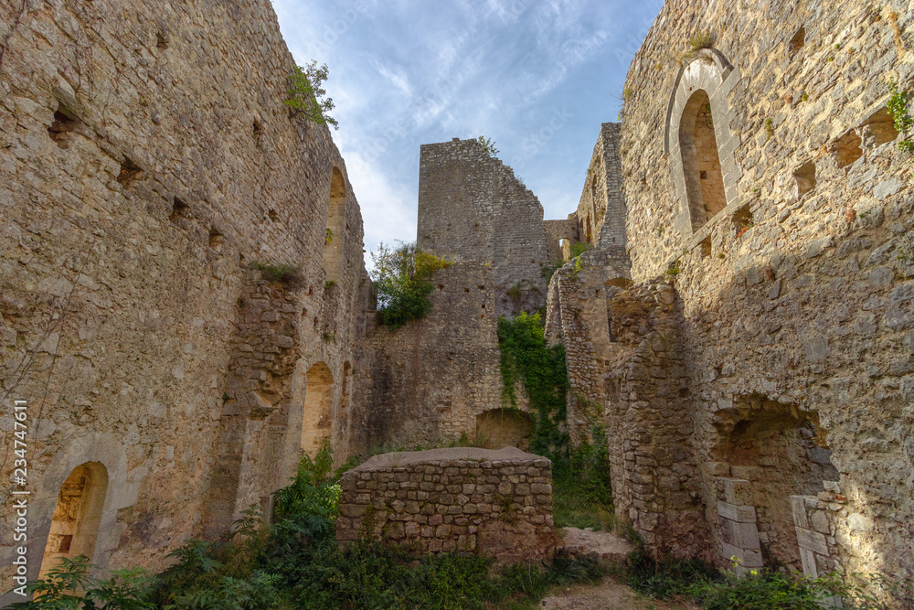 The ruins of the abandoned castle (Rocca di Piediluco) on the hill of the town of Piediluco. Umbria, italy