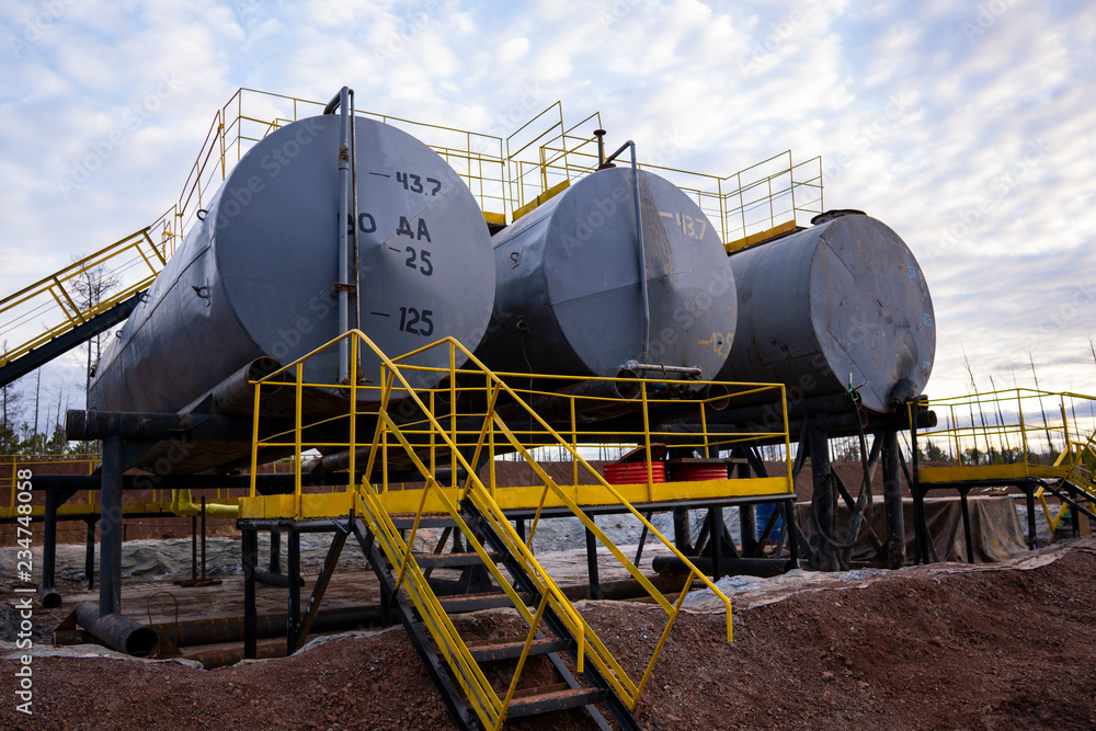 Oil industry. Oil Storage Tanks for petroleum products at the refinery. Septic tanks  will bring down the use of underground water treatment plant.
