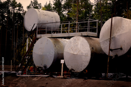 Oil industry. Oil Storage Tanks for petroleum products at the refinery. Septic tanks  will bring down the use of underground water treatment plant. © Алексей Закиров