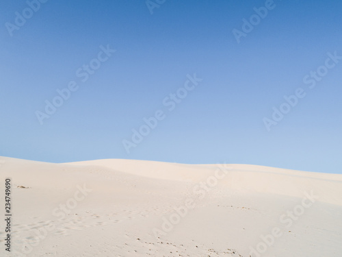 Amazing white dune, sand texture , blue sky pastel color, Brazil, Parnaíba. 