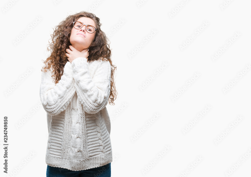 Beautiful brunette curly hair young girl wearing winter sweater over isolated background shouting and suffocate because painful strangle. Health problem. Asphyxiate and suicide concept. Beautiful brunette curly hair young girl wearing winter sweater over isolated background shouting and suffocate because painful strangle. Health problem. Asphyxiate and suicide concept.