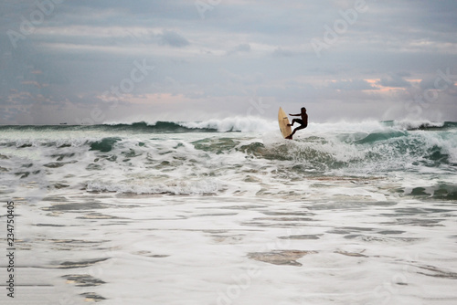 Surfing on a wave in the Indian Ocean © Venera