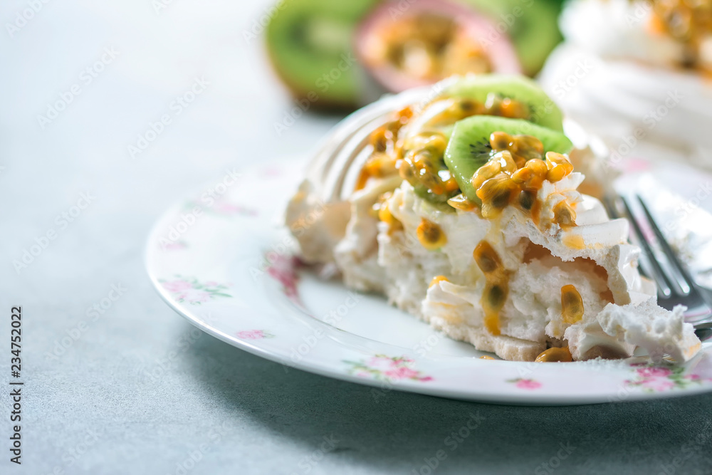Homemade cake Pavlova with whipped cream, fresh kiwi and passion fruit. Homemade cake Pavlova with whipped cream, fresh kiwi and passion fruit.