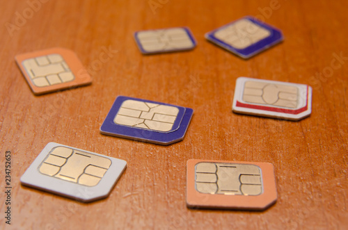 SIM cards on Wooden Table