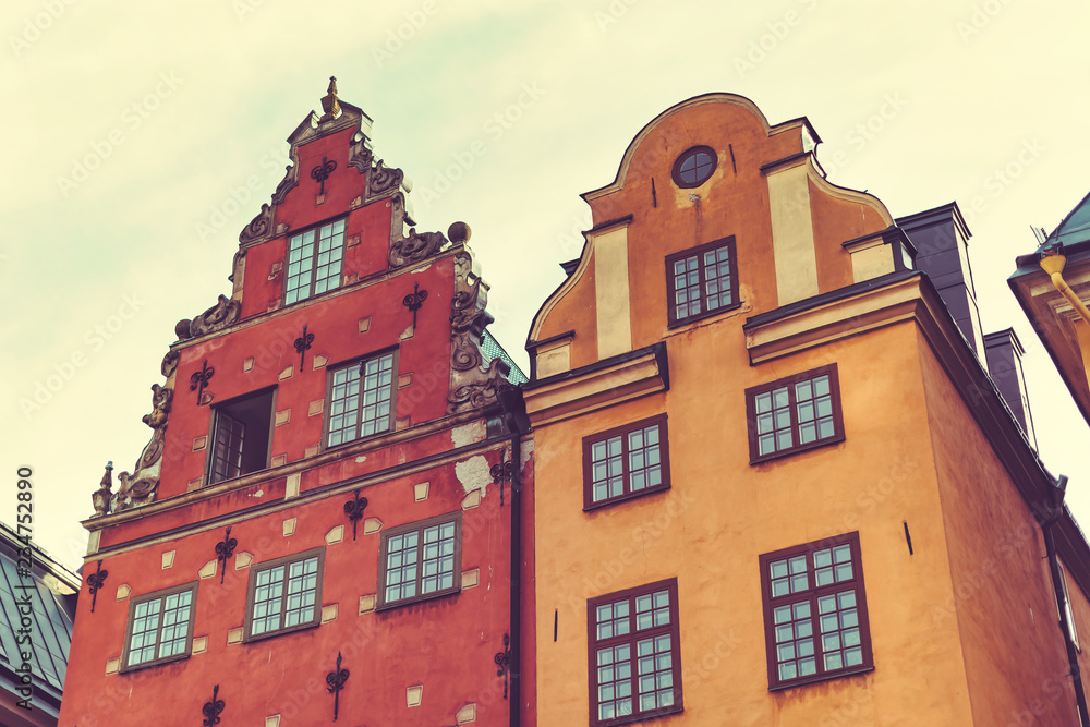 Facades of the colorful buildings at Stortorget in Gamla stan