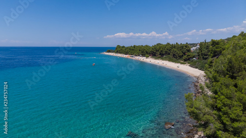 Drone aerial view of sea shore  sandy beach and blue water