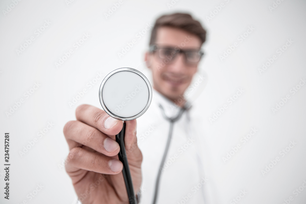 close up.stethoscope in the hands of the doctor