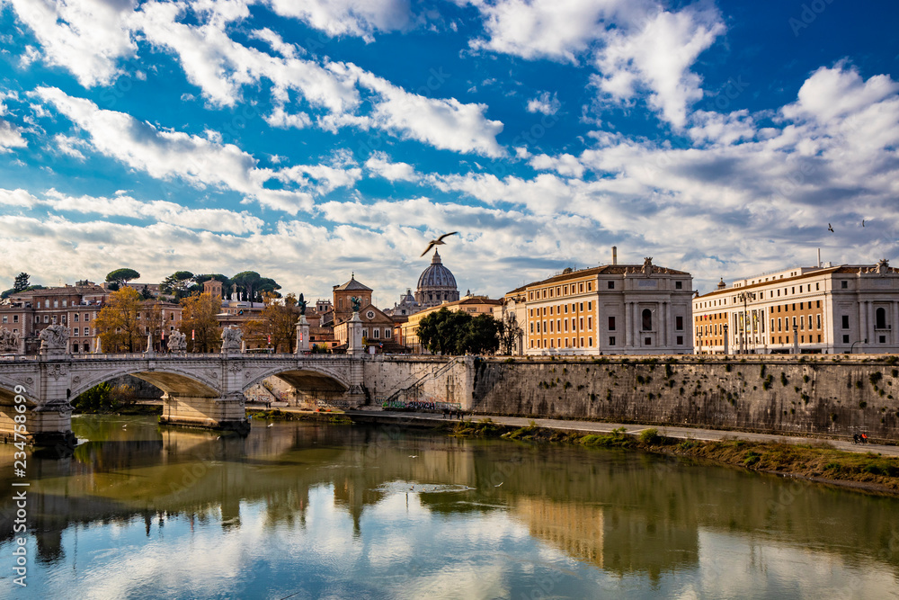 Obraz premium view of the Vittorio Emanuele II Bridge at sunset, with the Tiber, in Rome, Italy