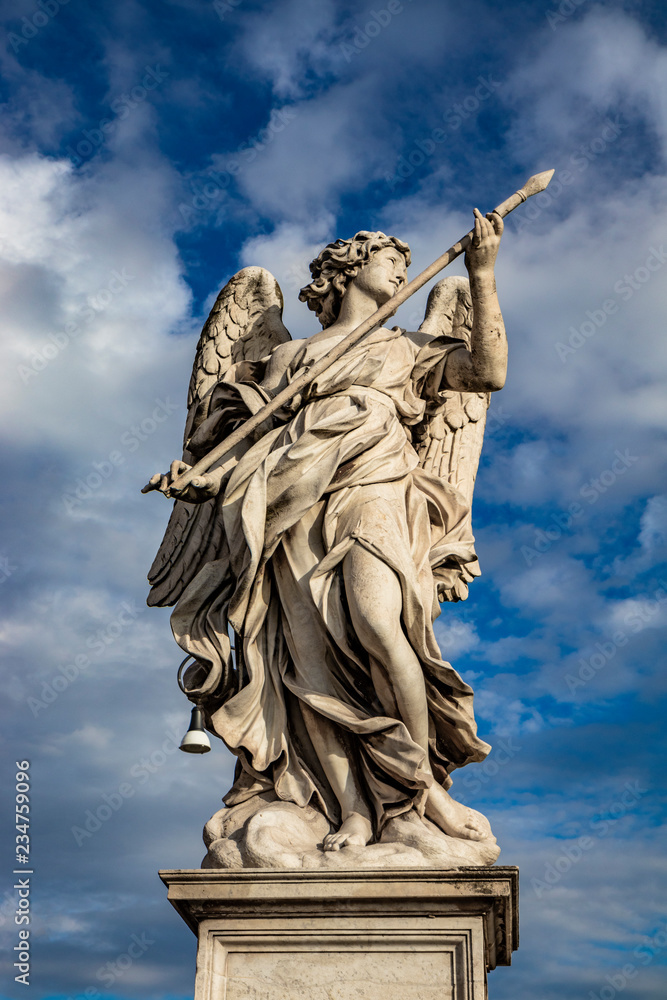 Angel with the lance on the Ponte Sant'Angelo over the Tiber, at the Mausoleum of Roman Emperor Hadrian, usually known as Castel Sant'Angelo, in Rome, near the Vatican. Italy