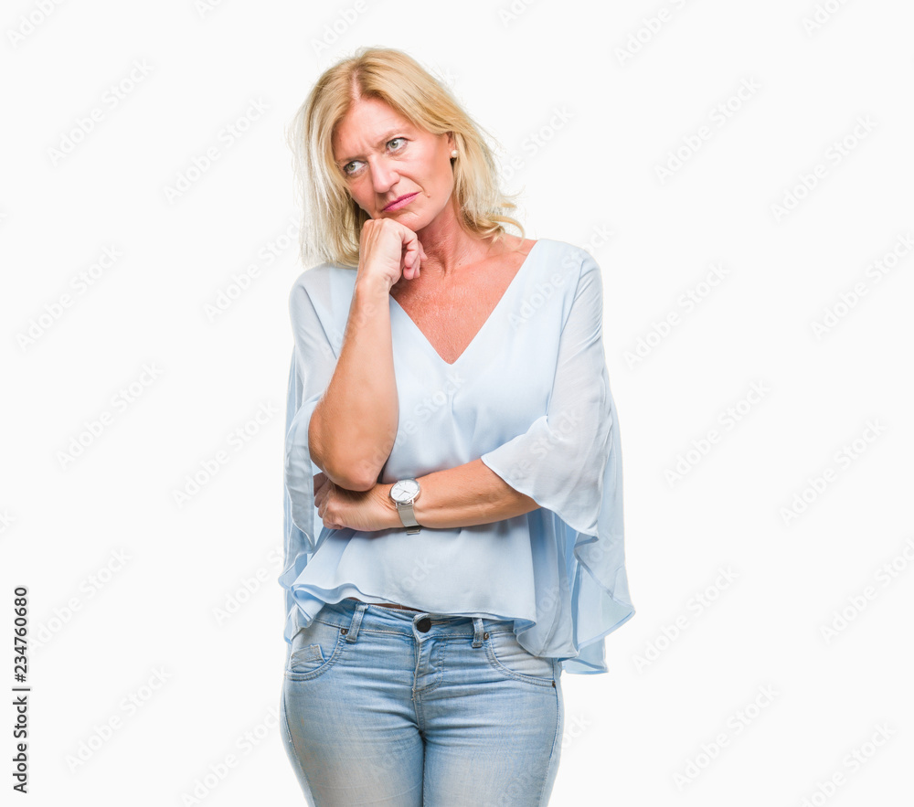 Middle age blonde business woman over isolated background thinking looking tired and bored with depression problems with crossed arms. Middle age blonde business woman over isolated background thinking looking tired and bored with depression problems with crossed arms.