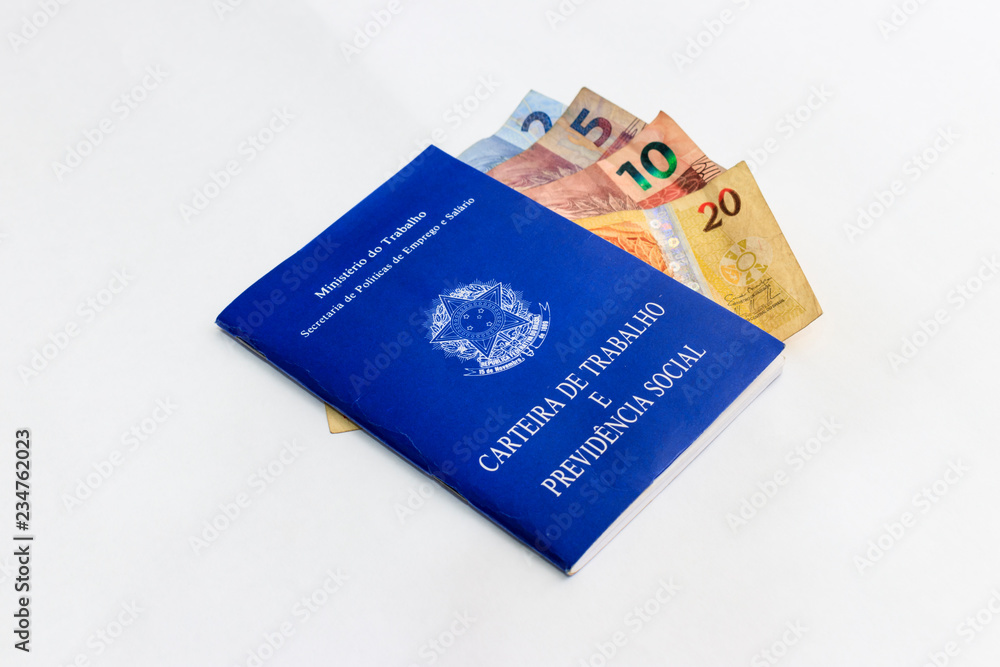 Brazilian labor and social security document with real notes, white background Brazilian labor and social security document with real notes, white background