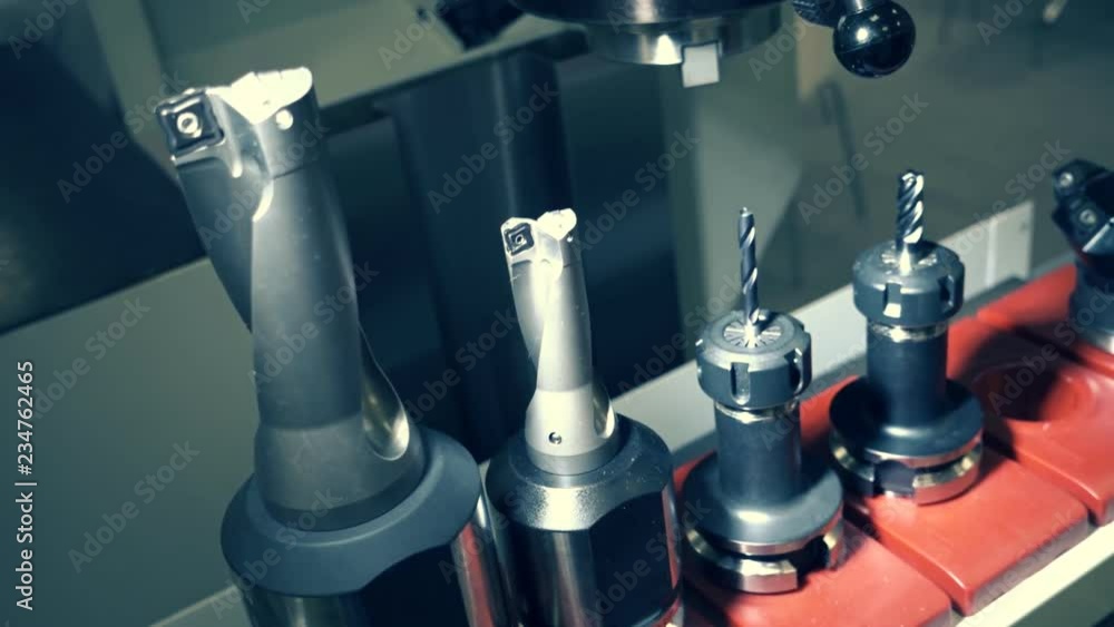 Set of mills for the machine with CNC. Shot in motion
Set of mills for the machine with CNC. Shot in motion