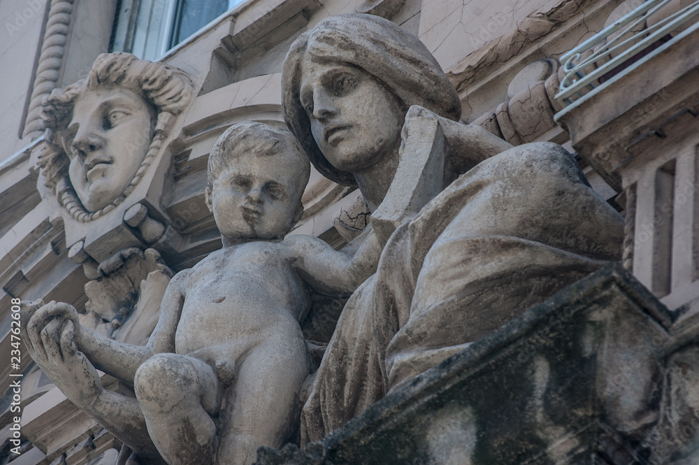 statue of mother and child in Genoa