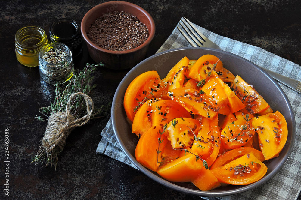 Healthy salad of yellow tomatoes with thyme. Vegan Tomato Salad. Healthy salad of yellow tomatoes with thyme. Vegan Tomato Salad.