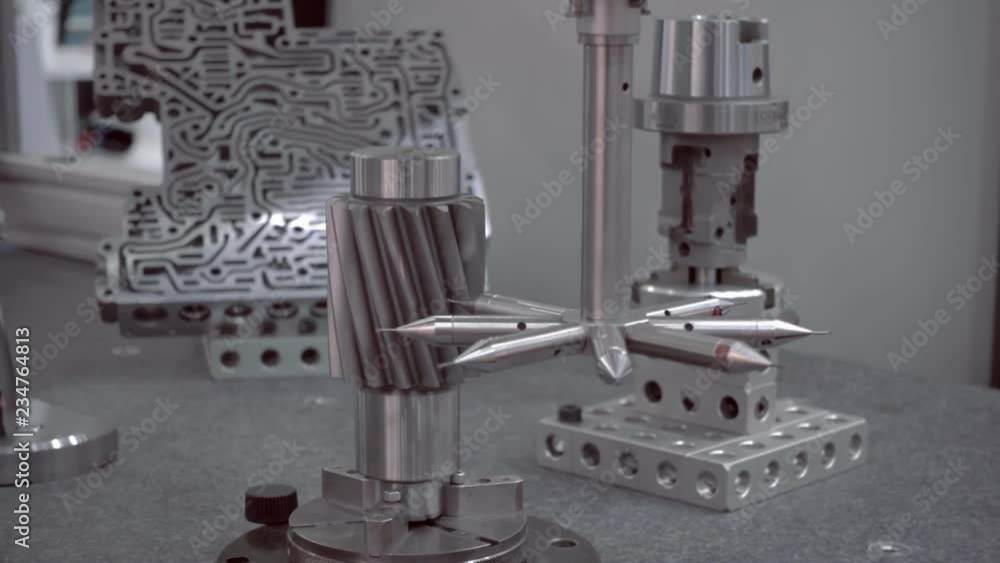 The probe of the coordinate measuring machine (CMM) touch to the ...