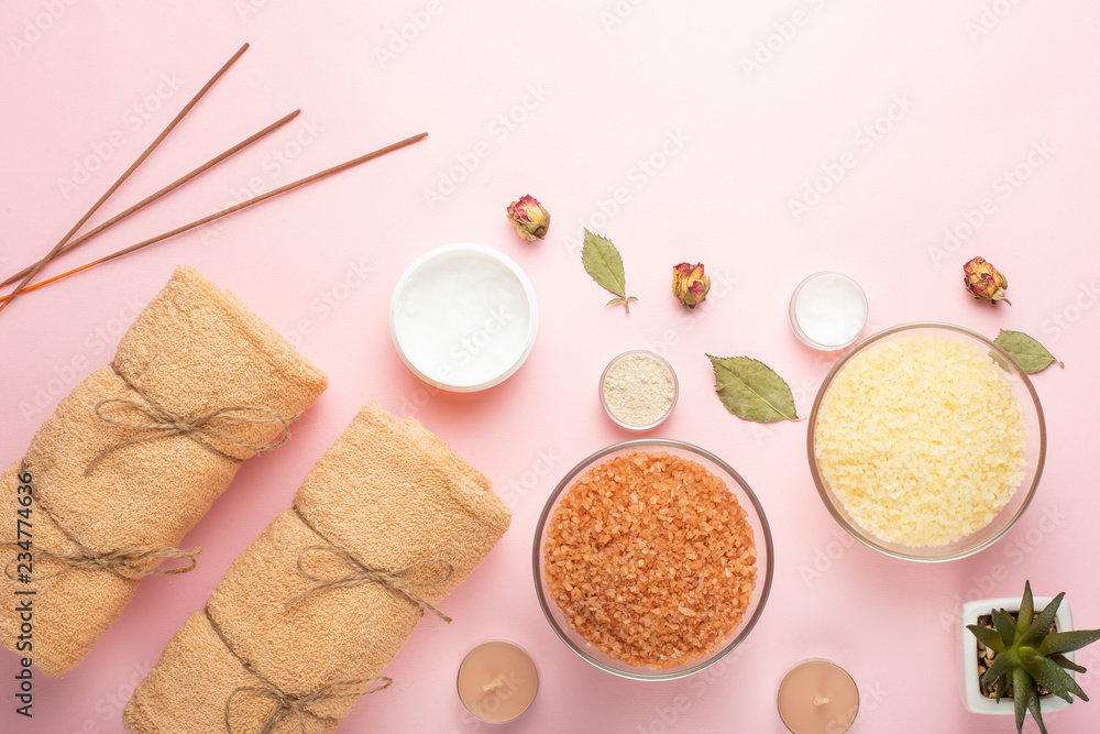 Beautiful spa composition on a pink background. Spa, relaxation, skin care and beauty Beautiful spa composition on a pink background. Spa, relaxation, skin care and beauty