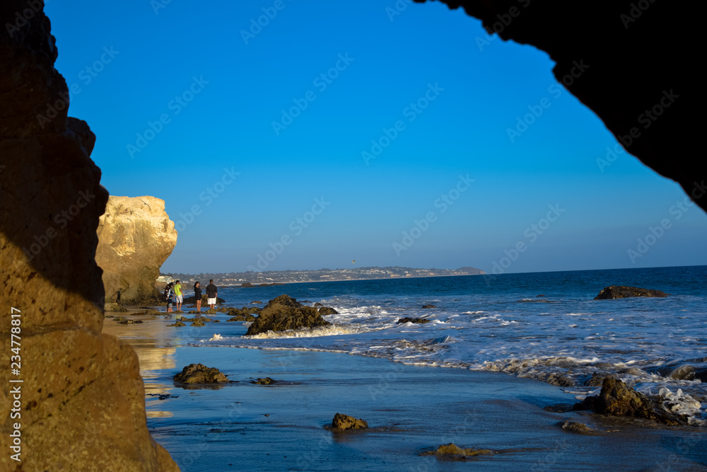 Rock formations in the late afternoon on El Matator State Beach in Malibu, California