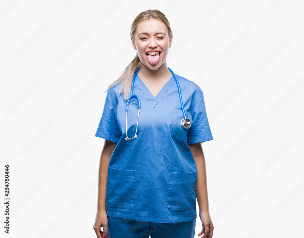 Young blonde surgeon doctor woman over isolated background sticking tongue out happy with funny expression. Emotion concept. Young blonde surgeon doctor woman over isolated background sticking tongue out happy with funny expression. Emotion concept.
