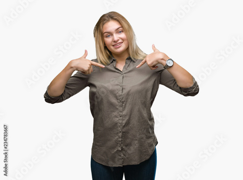 Young caucasian business woman over isolated background looking confident with smile on face, pointing oneself with fingers proud and happy.