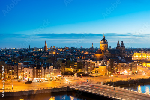 Amsterdam skyline in historical area at night, Netherlands. Ariel view of Amsterdam, Netherlands.