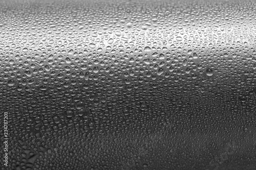 Aluminum sports water bottle covered with drops, closeup