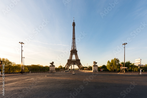 Eiffel Tower and river Seine at sunrise in Paris, France. Eiffel Tower is one of the most iconic landmarks of Paris. © ake1150