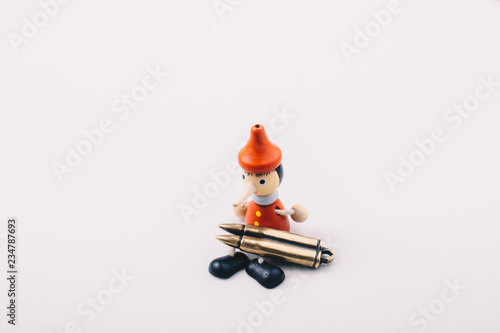 Bullet and wooden pinocchio...
