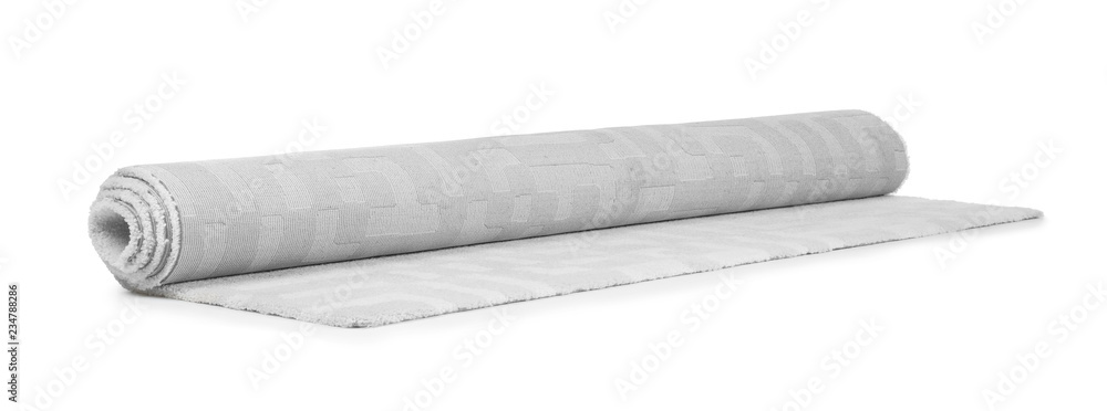 Rolled soft carpet on white background. Interior element Rolled soft carpet on white background. Interior element