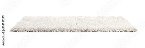 Fotografie Fuzzy carpet on white background. Interior element