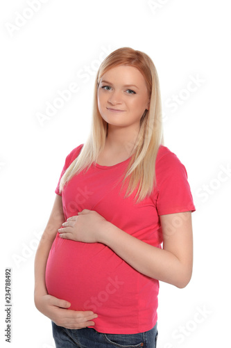 Young beautiful pregnant woman on white background © New Africa