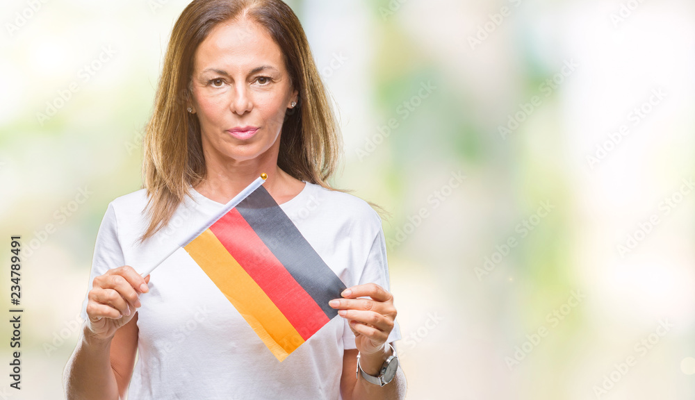 Middle age hispanic woman holding flag of Germany over isolated background with a confident expression on smart face thinking serious
