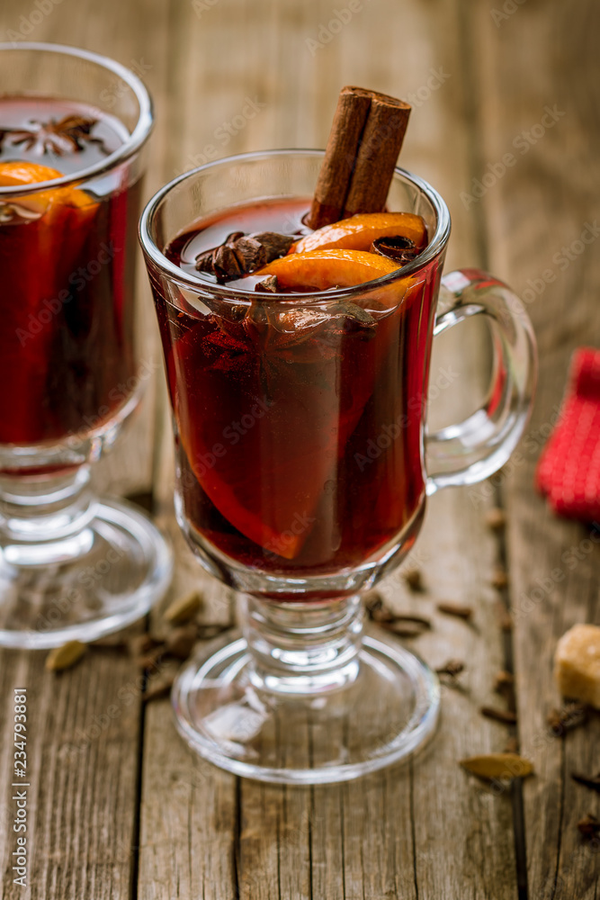 Mulled wine on old wooden background Mulled wine on old wooden background