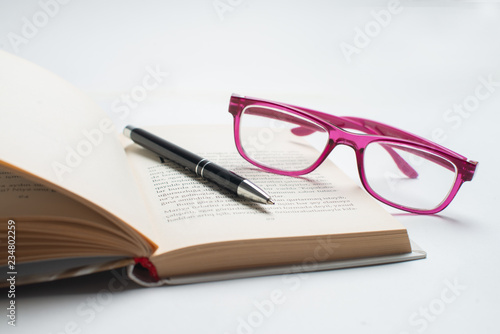 Notebook with glasses and pen, Book with glasses, Blue notebook with glasses, Book with cup of tea