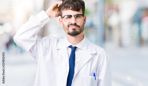 Photography Young professional scientist man wearing white coat over isolated background confuse and wonder about question