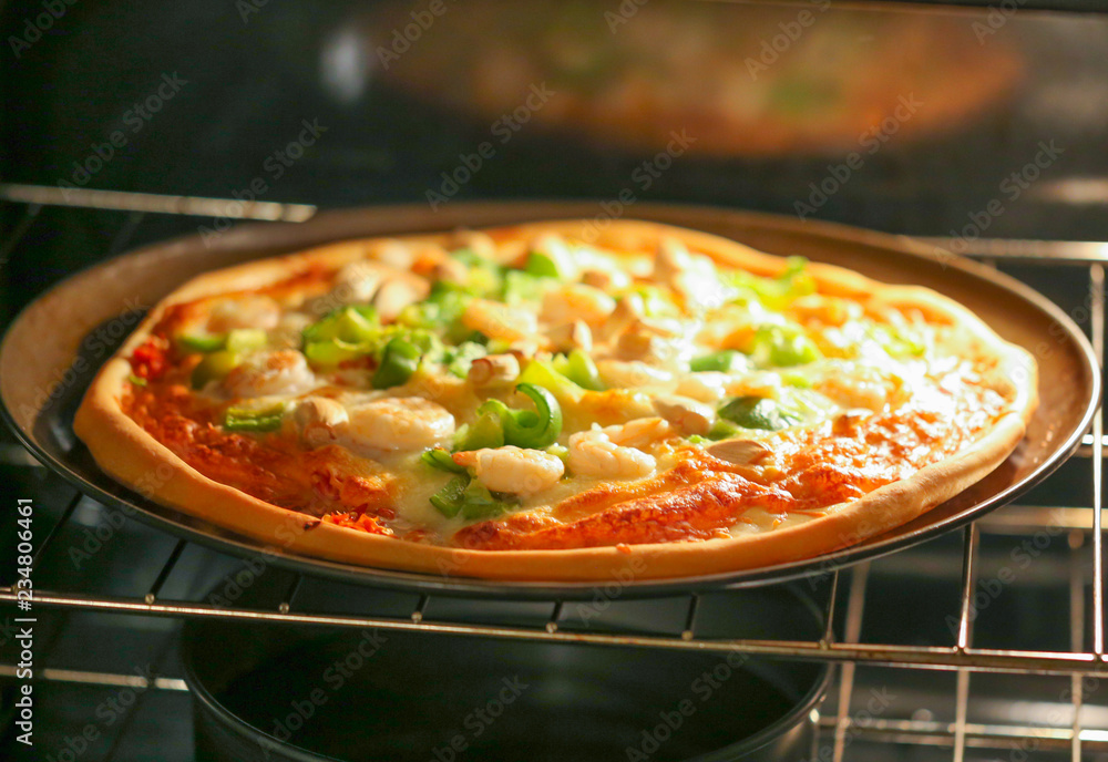 Pizza with seafood close up.