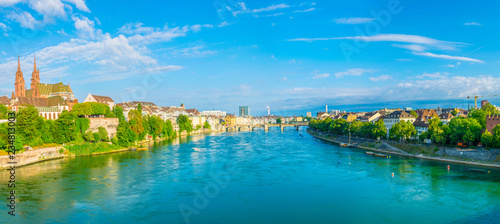 Photos Riverside of Rhine in Basel dominated by majestic building of Munster church, Sw
